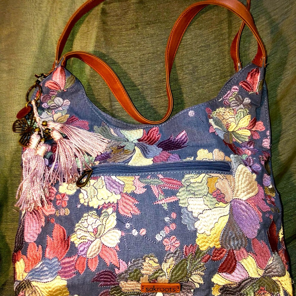 Sak Roots embroidered flower print purse.